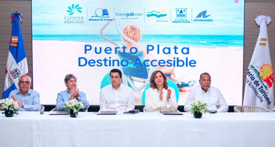 En la mesa que presidió el acto figuran César José de los Santos, presidente de la Asociación de Hoteles, Condominios y Establecimientos Comerciales de Playa Dorada; Rafael Blanco, presidente de TRAVEGALI; Birgitt Heinsen, presidente del Clúster Turístico del Destino Puerto Plata; David Collado, ministro de Turismo y Diómedes Roque García Núñez, alcalde del municipio.